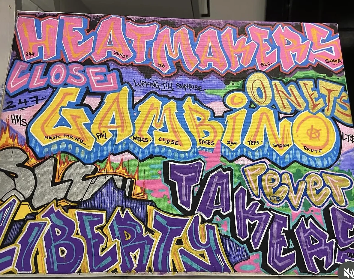 Colourful painted canvas filled with layered graffiti lettering in pink, yellow, blue, purple and green